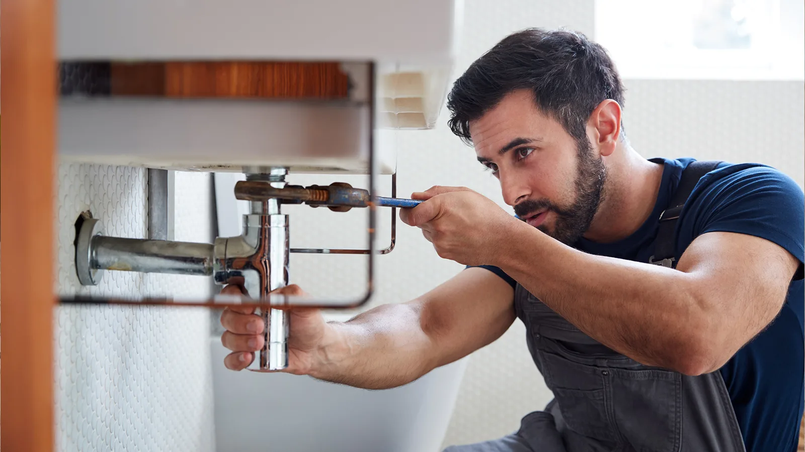 how to fox a stuck sink stopper from below